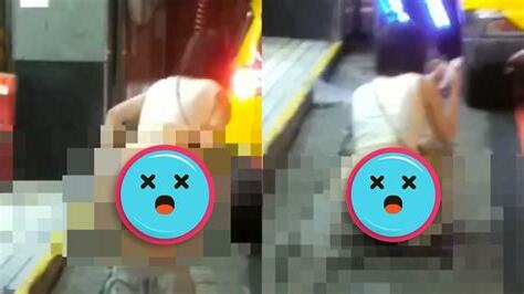 屁股慘被看光！年輕女路邊脱褲蹲水溝蓋 路人看傻眼